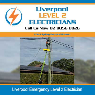 Emergency level 2 electrician working on emergency repair on overhead electrical lines in Liverpool 