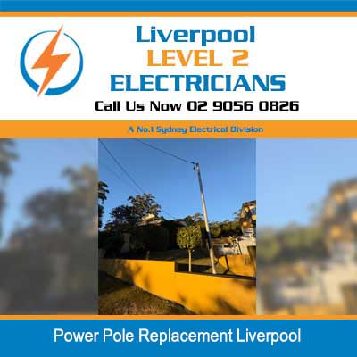 Power pole replacement with overhead lines on residential street in Liverpool